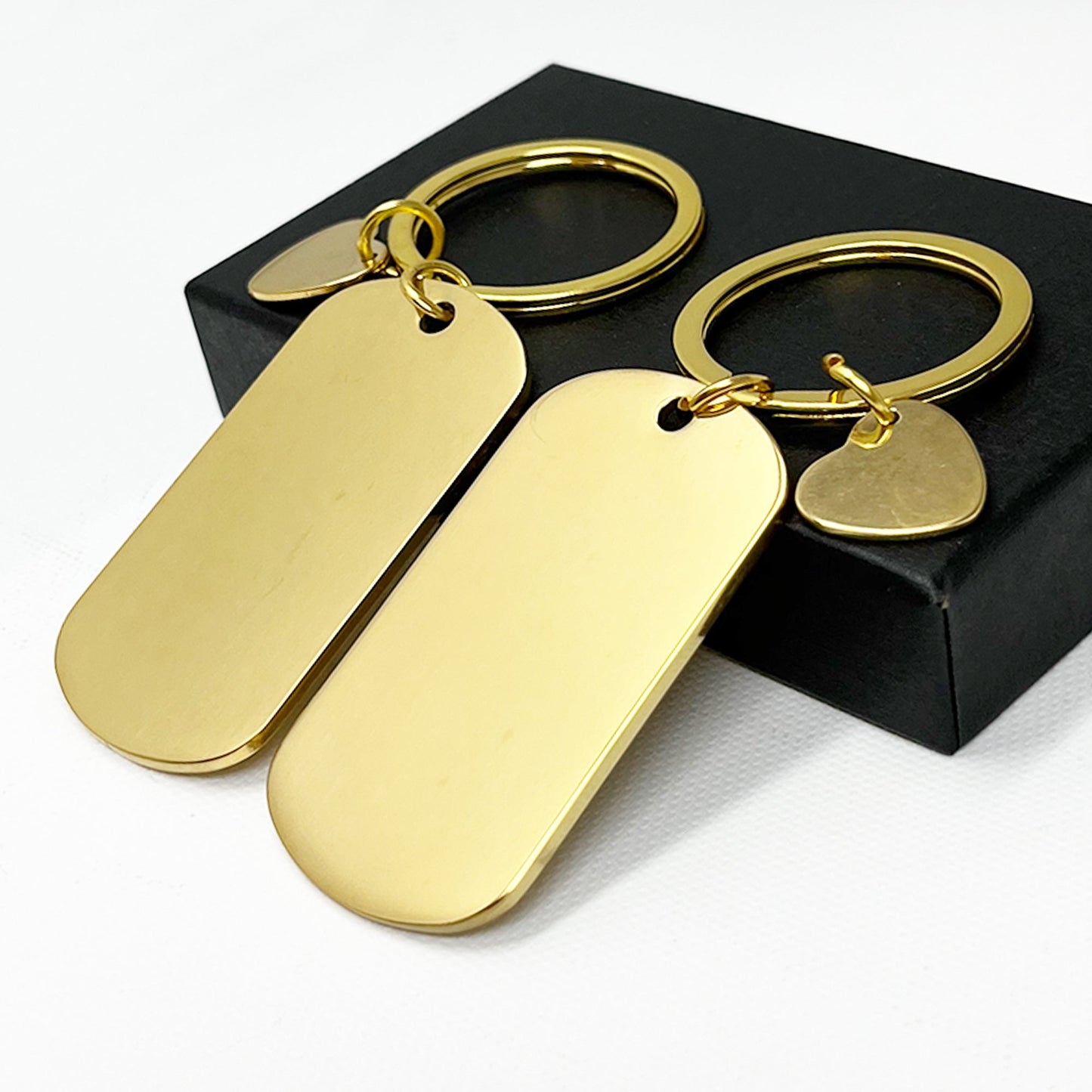 Custom gold keepsake featuring a heart detail, beautifully packaged in a refined black gift box – A thoughtful gift