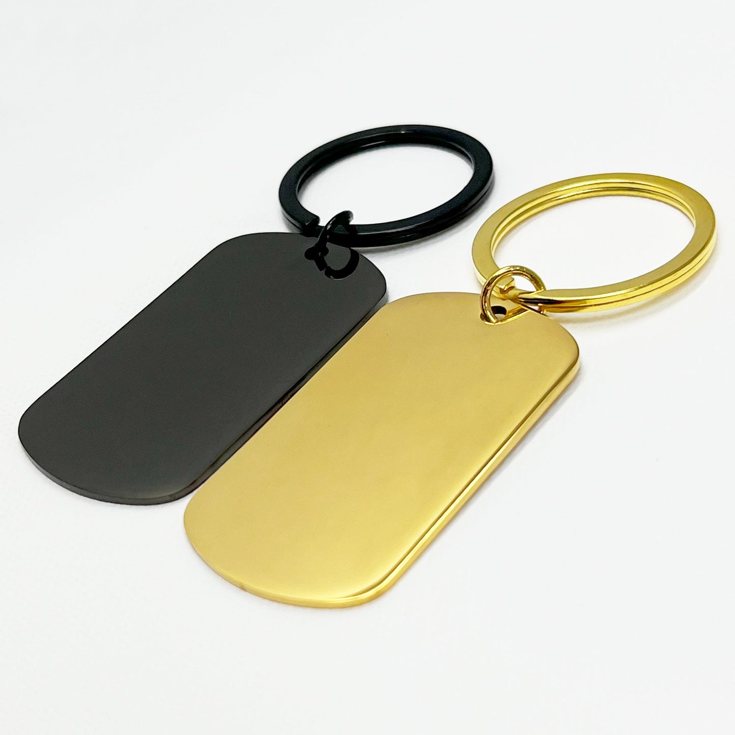 Engraved black and gold oval keychains in an elegant black gift box – A memorable custom gift set