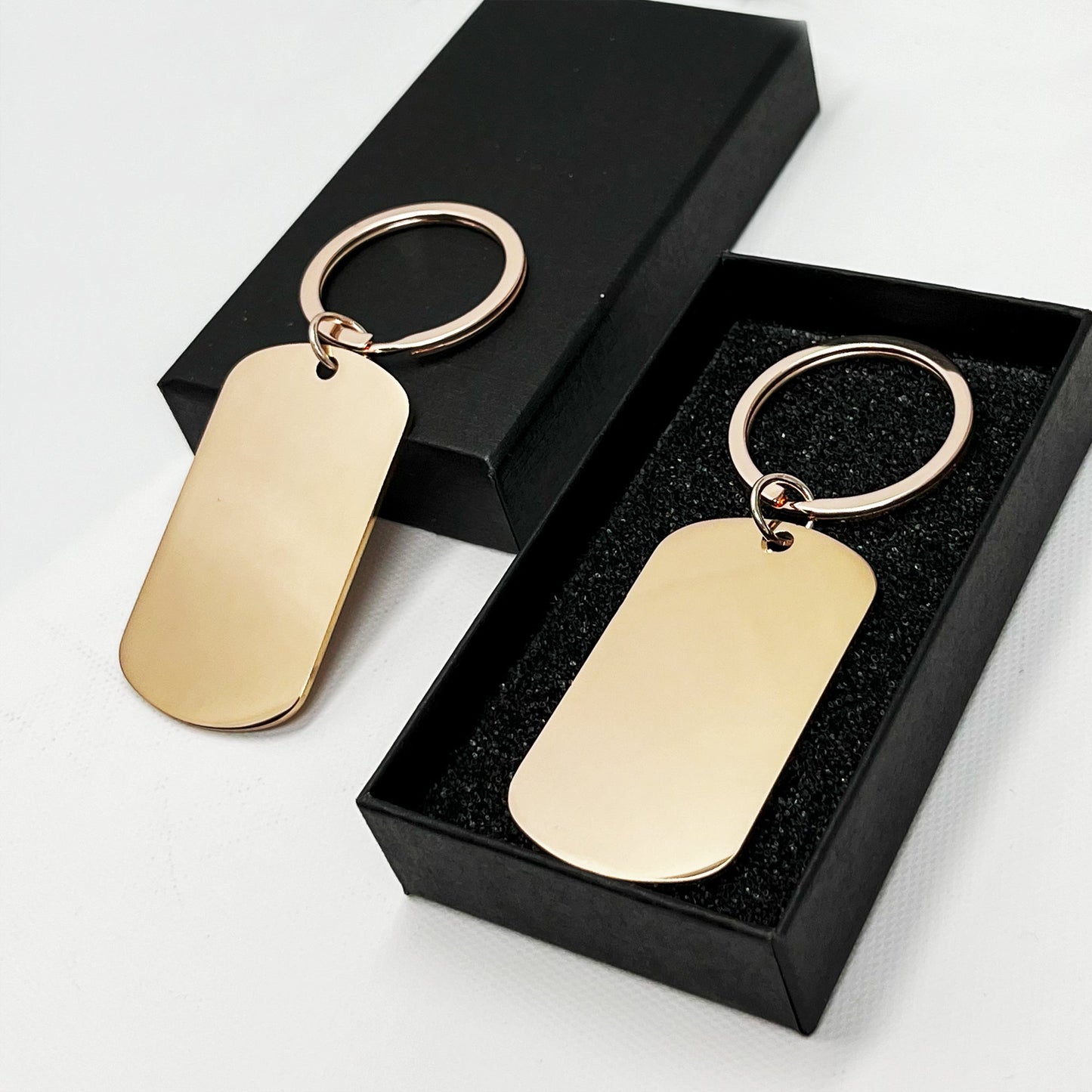 Gold oval keychain in a premium black gift box – A perfect personalised present