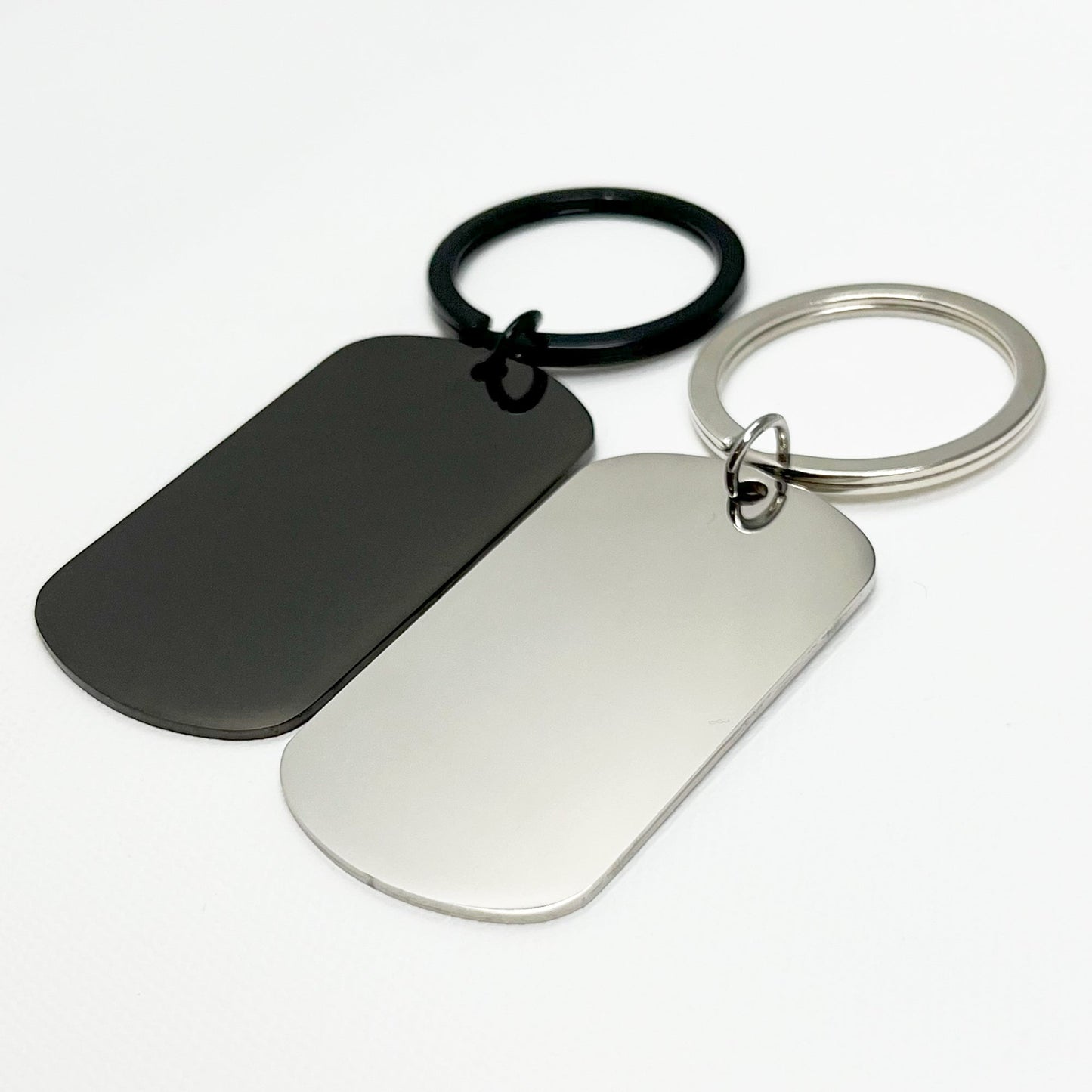Modern black and silver keychain set displayed in an elegant black gift box – Unique gift idea