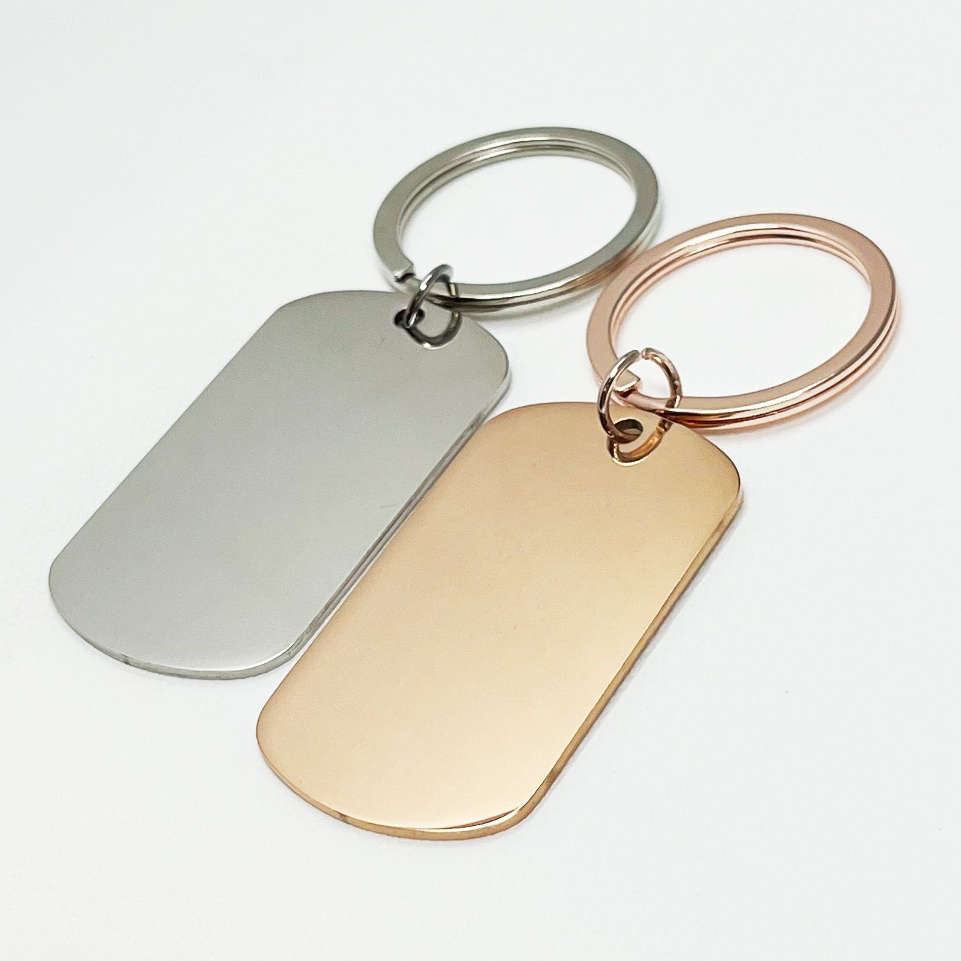 Stylish silver and rose gold oval keychains in a modern black gift box – Custom engraved keepsakes